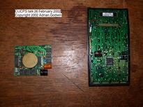 [Photo of full-nut CPU board and half-nut HP41CV]